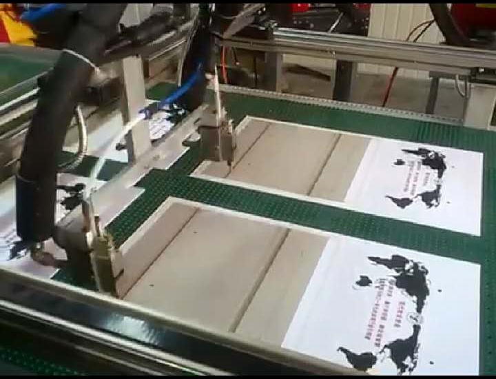 印刷制品自动打胶